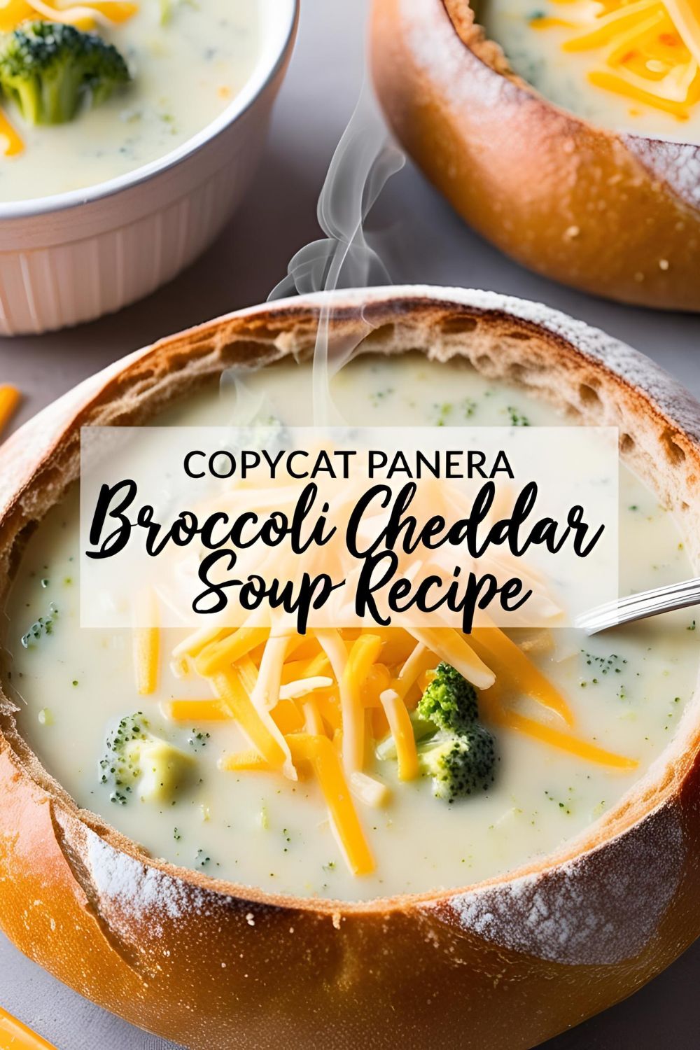 Close-up of creamy Panera broccoli cheddar soup served in a bread bowl, topped with melted cheese and fresh broccoli, styled for a cozy homemade meal vibe.