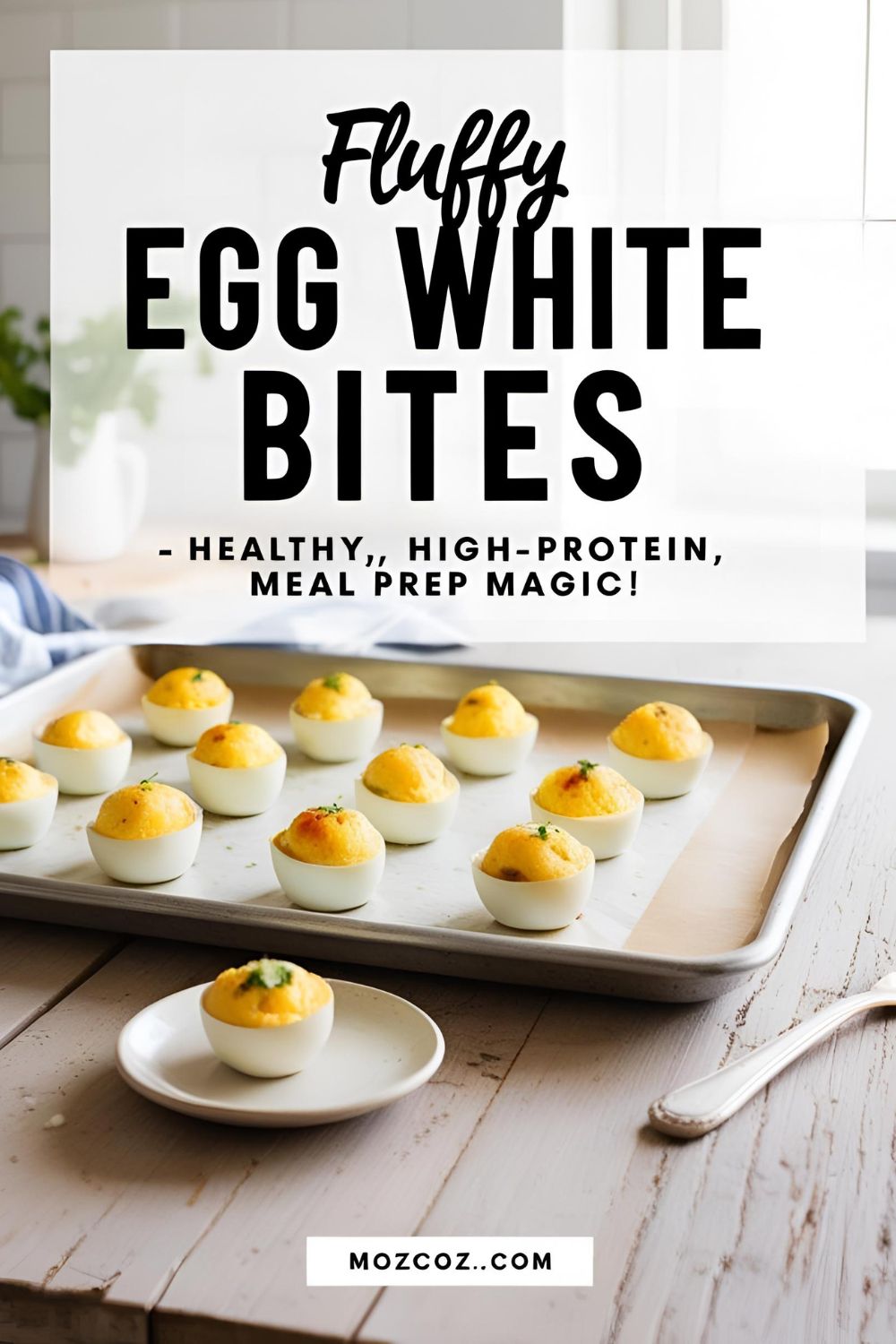 Overhead photo of fluffy egg white bites on a plate with colorful veggies, ideal for meal prep or a healthy breakfast.