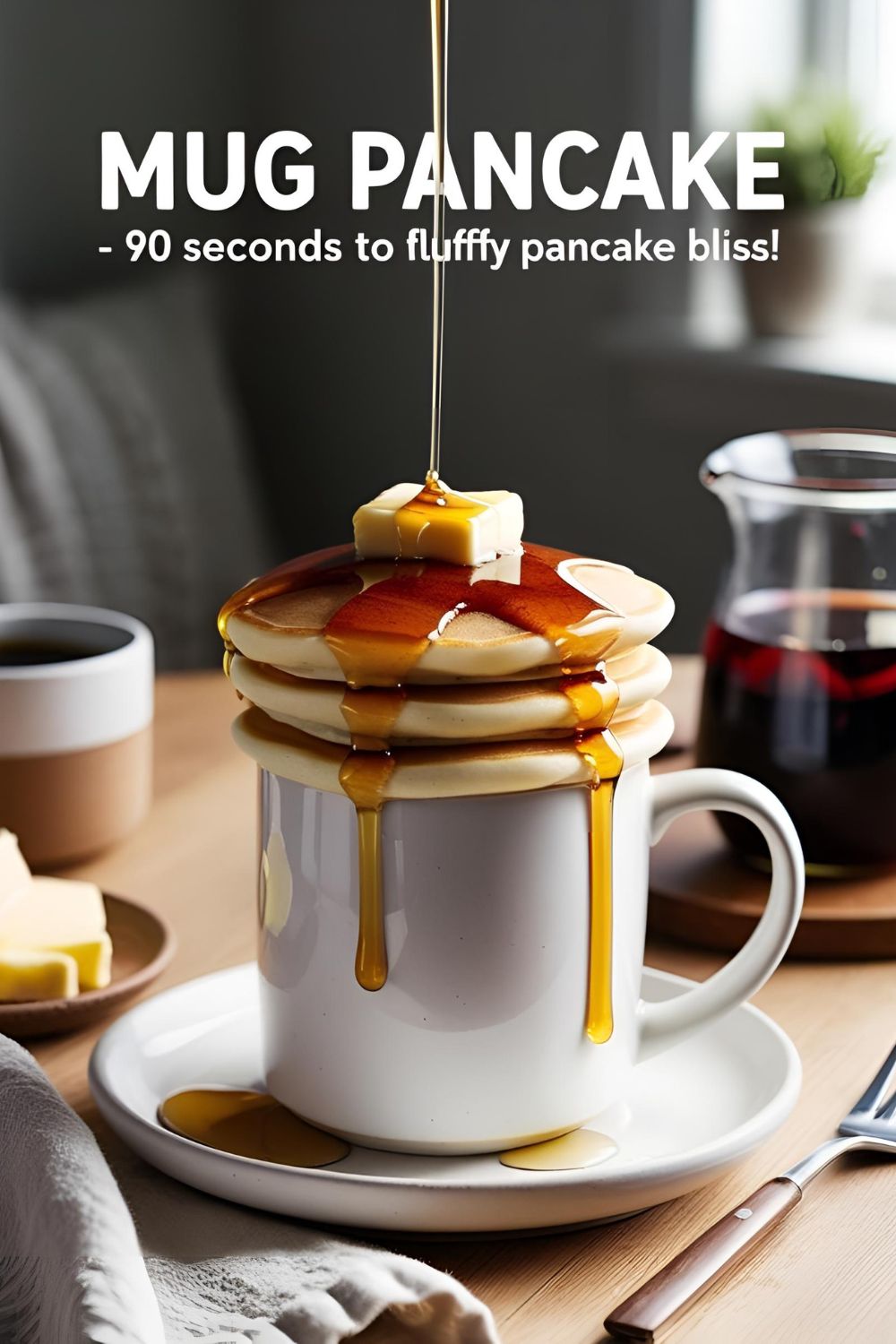 Fluffy mug pancake with syrup and butter made in a microwave, perfect for quick and easy breakfasts.