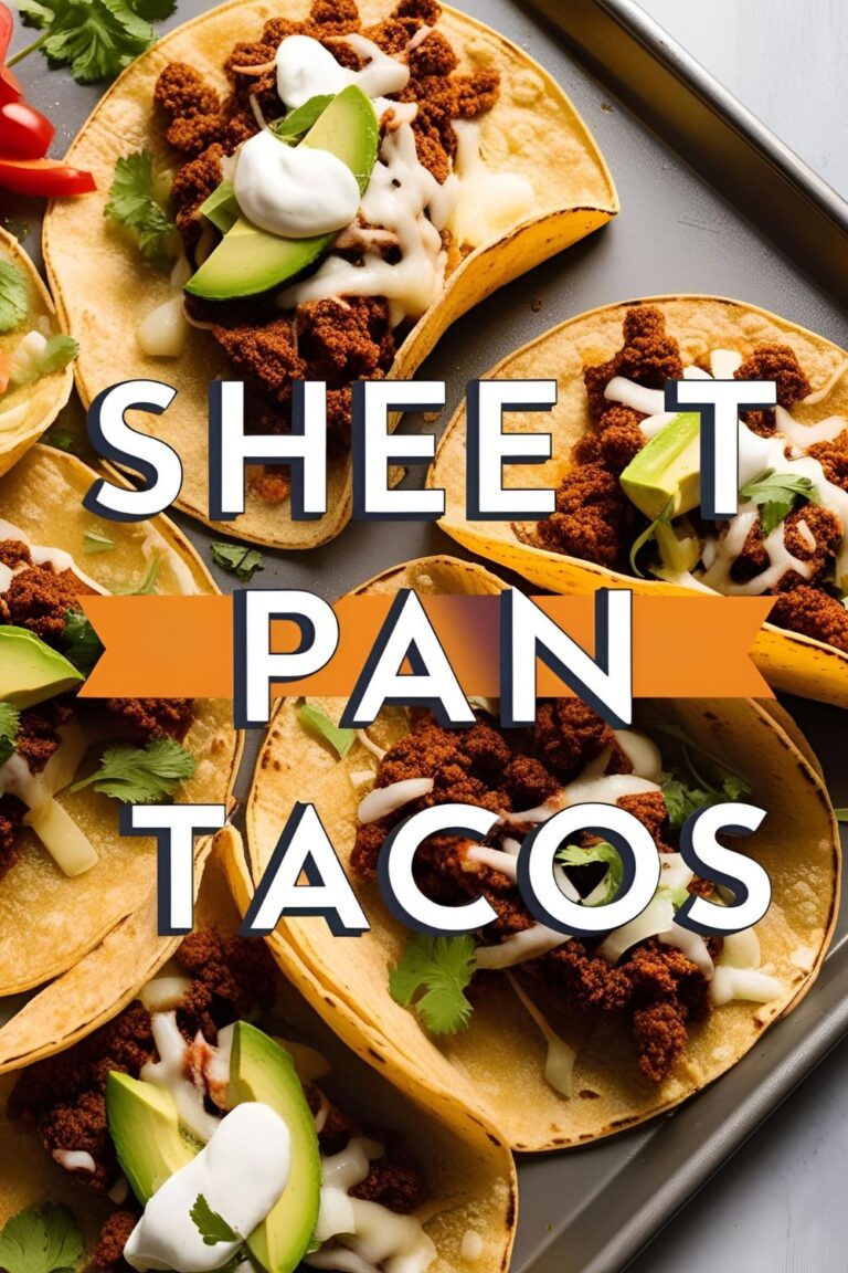 Overhead shot of crispy sheet pan tacos arranged on a baking tray with melted cheese, toppings, and lime wedges.