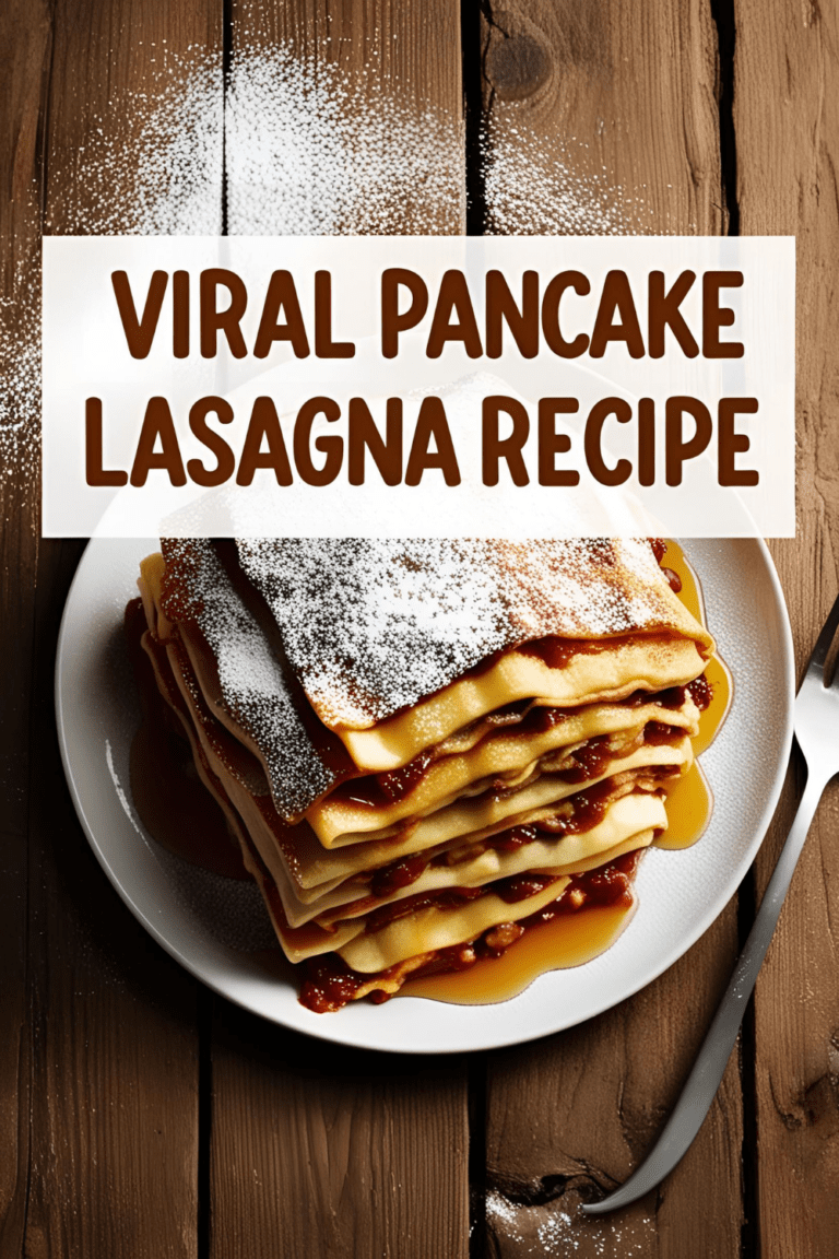 Overhead shot of a layered viral pancake lasagna topped with cream and berries on a wooden table