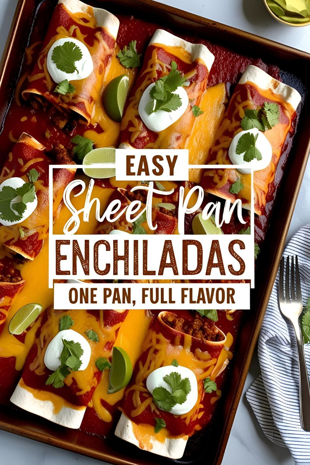 A tray of golden-baked sheet pan enchiladas topped with melted cheese and fresh cilantro.