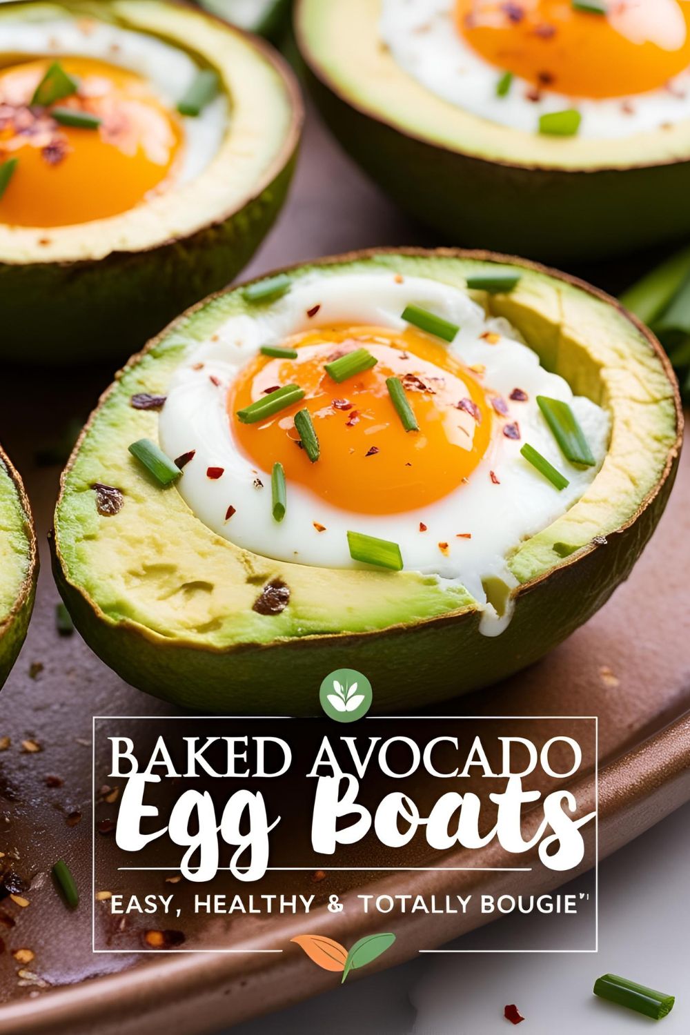 Close-up image of perfectly baked avocado egg boats topped with chives and chili flakes