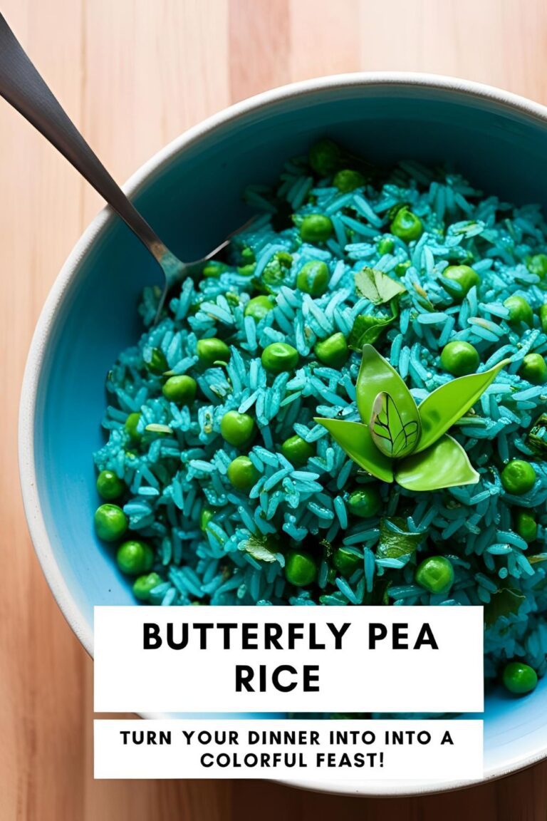 A bowl of vibrant blue butterfly pea rice garnished with edible flowers.