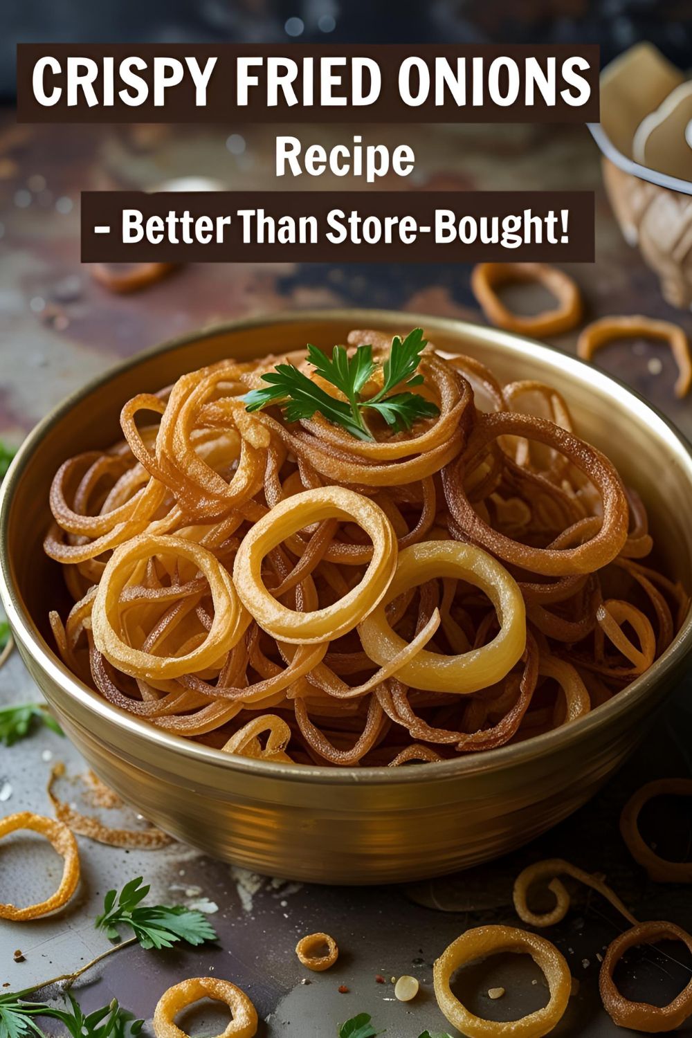 Close-up image of golden crispy fried onions stacked on parchment paper