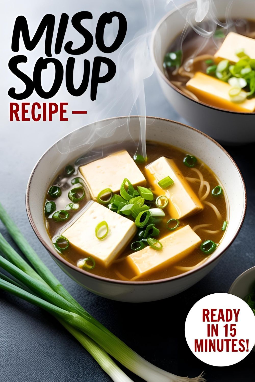 A steaming bowl of quick miso soup with tofu and green onions.