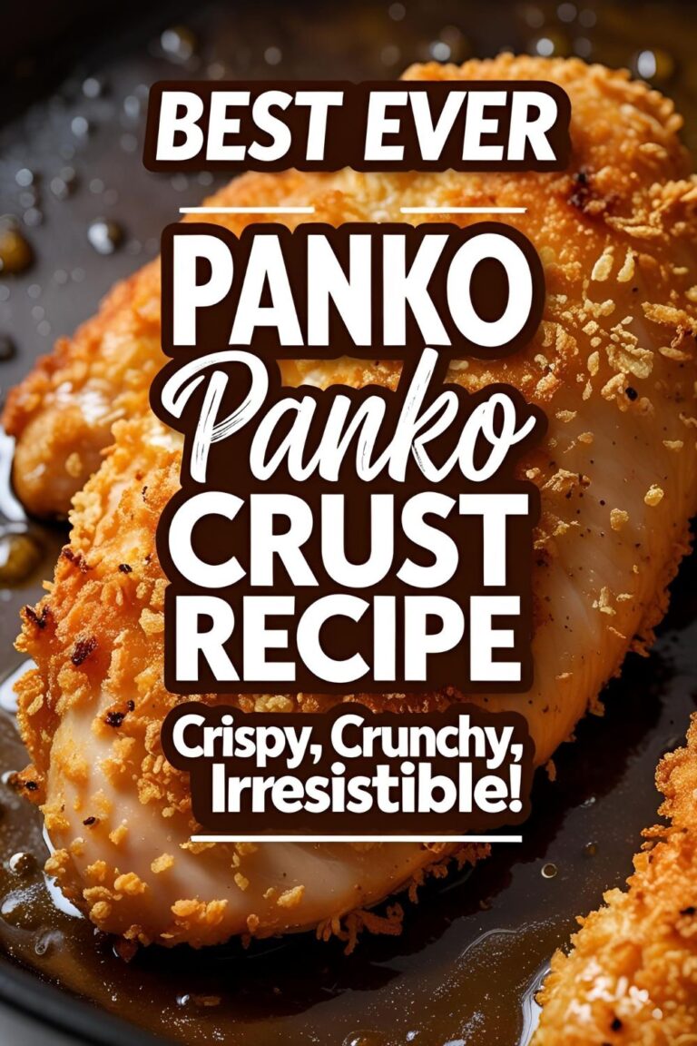 Golden panko crusted chicken on a plate with side sauce and herbs