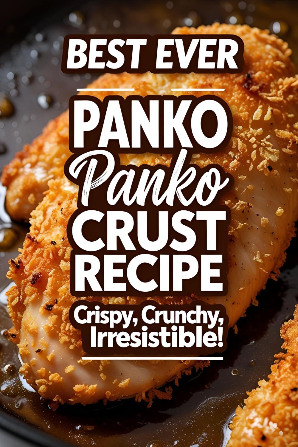 Golden panko crusted chicken on a plate with side sauce and herbs