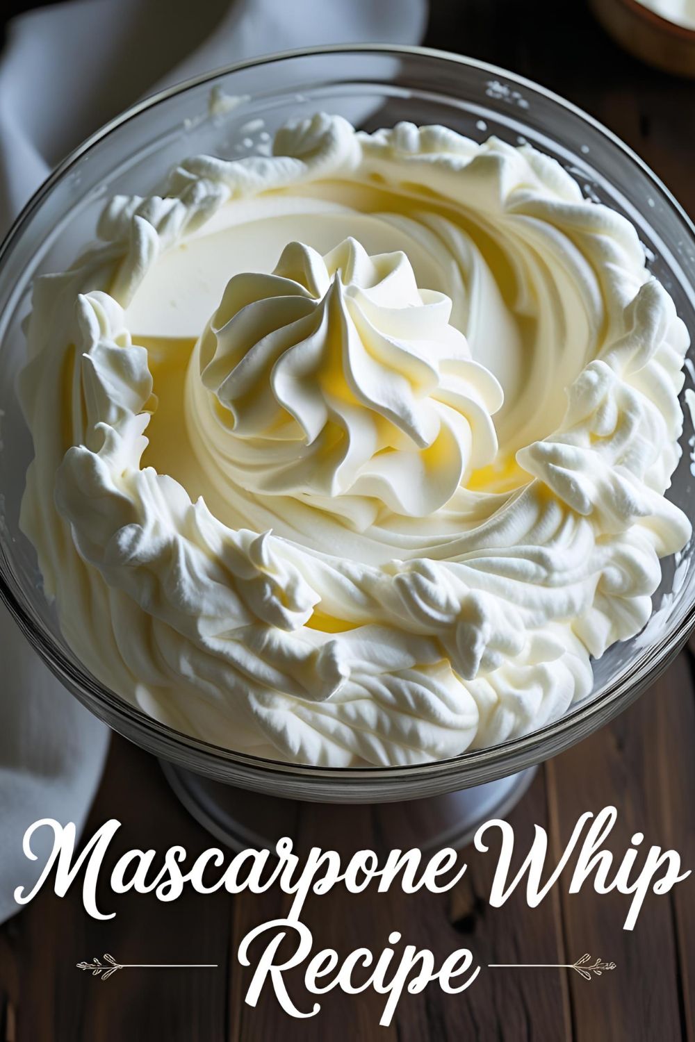 Bowl of creamy mascarpone whip with spoon, styled with berries and elegant text overlay for mascarpone whip recipe.