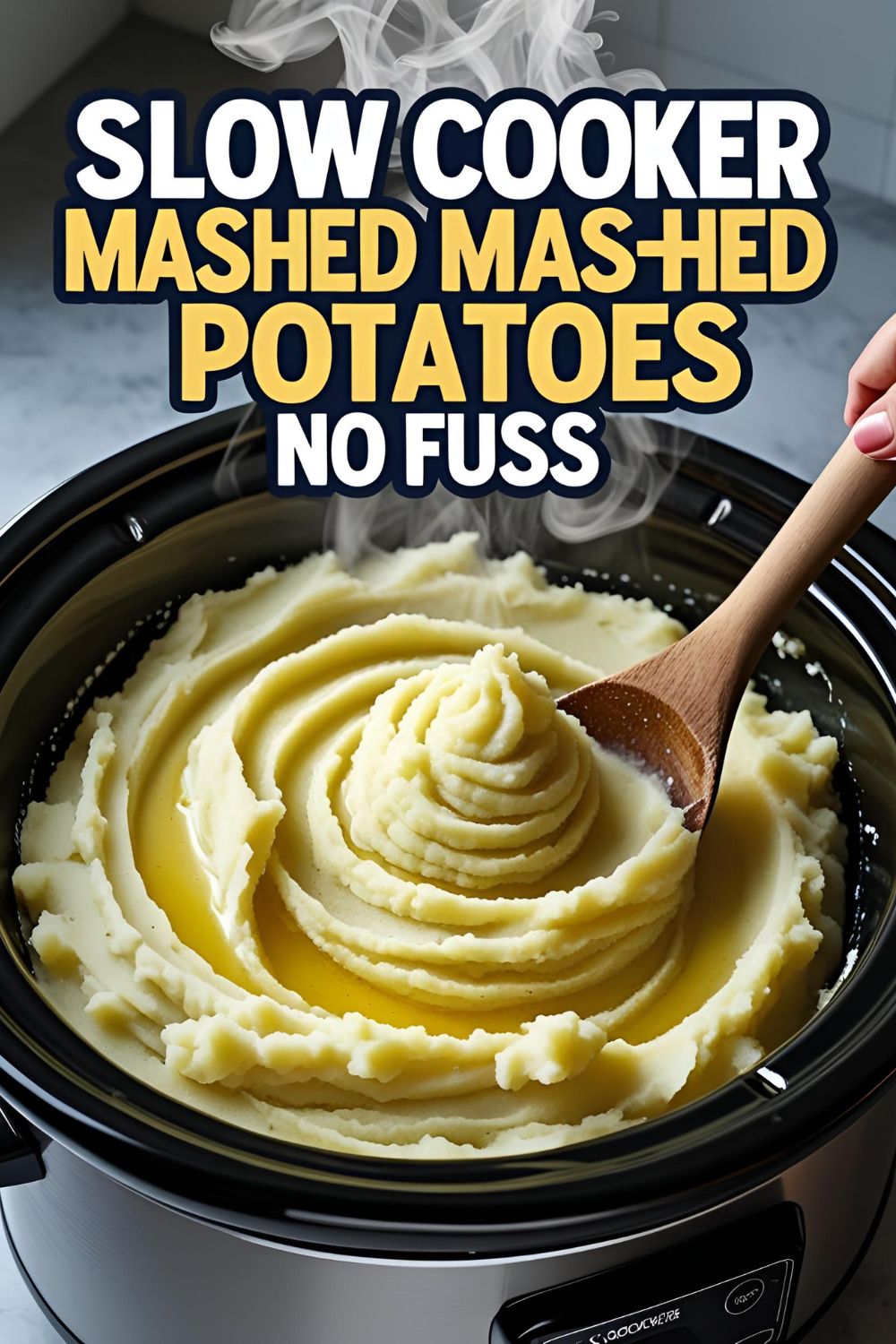 Bowl of creamy slow cooker mashed potatoes garnished with chives.