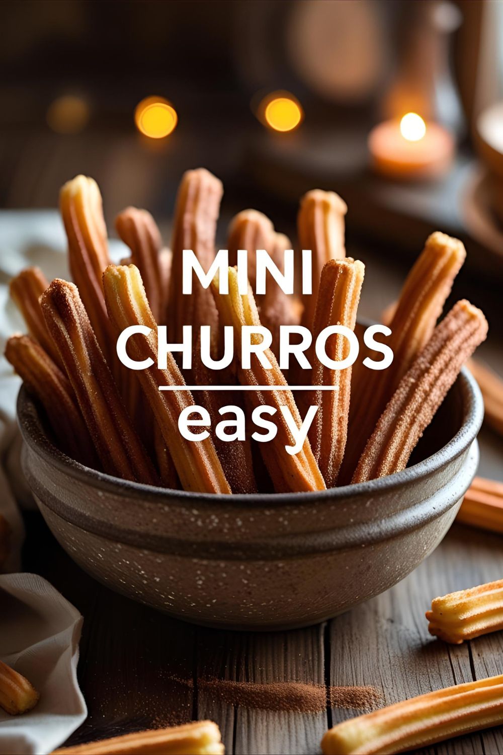 Pile of mini churros with cinnamon sugar in rustic bowl