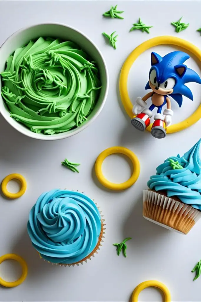 A flat-lay photo of supplies for a Sonic cake, including green and blue frosting, fondant rings, and a Sonic the Hedgehog toy.