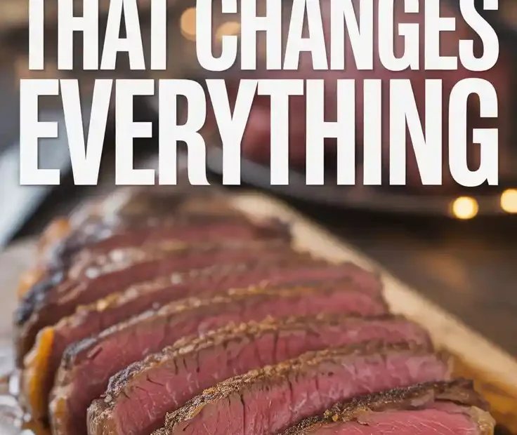 A Pinterest pin with the text "The Toaster Oven Steak Hack That Changes Everything" over a photo of a perfectly sliced ribeye steak.