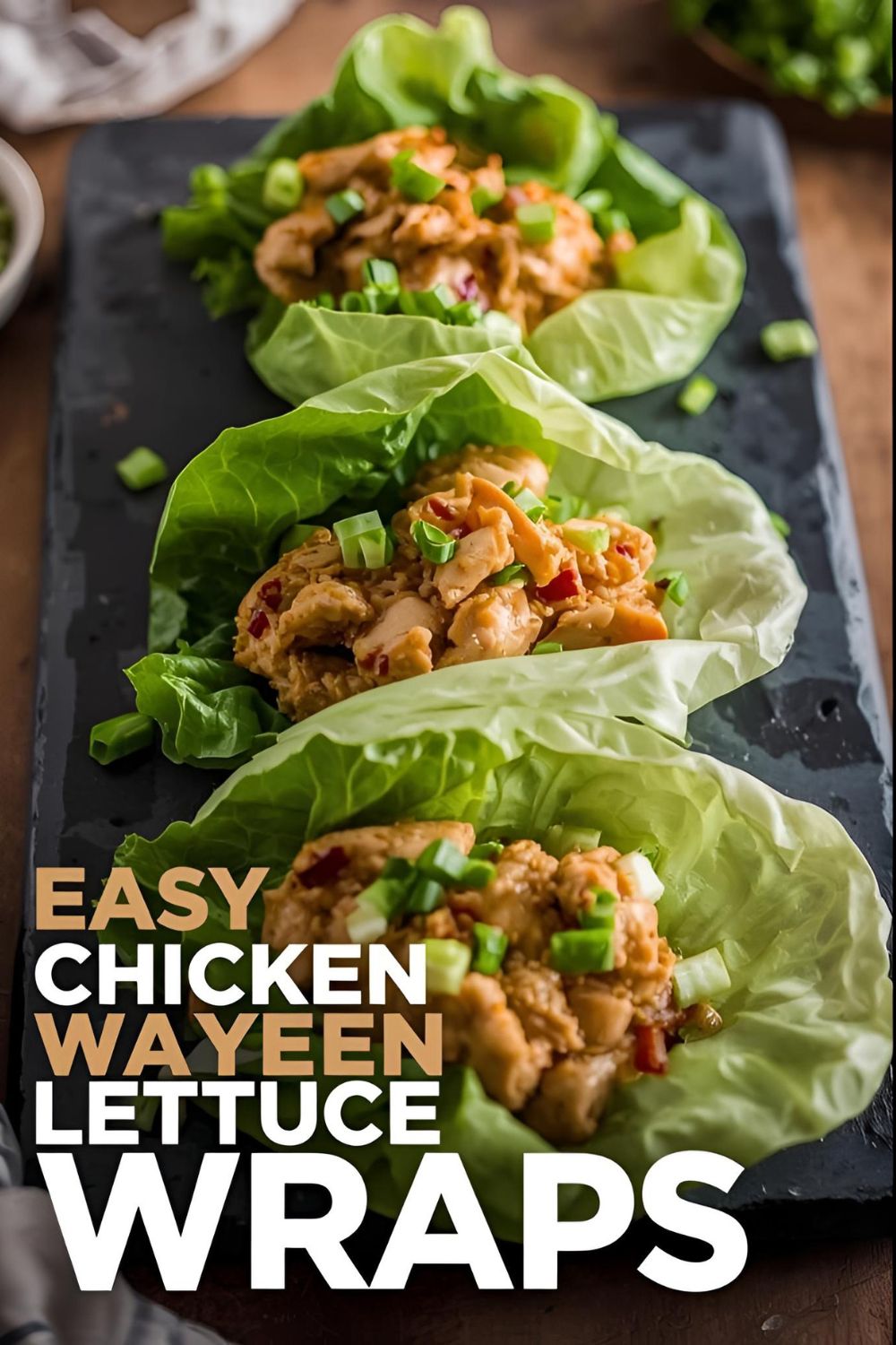 Three delicious homemade chicken lettuce wraps on a platter, with the text overlay "Easy Chicken Lettuce Wraps."