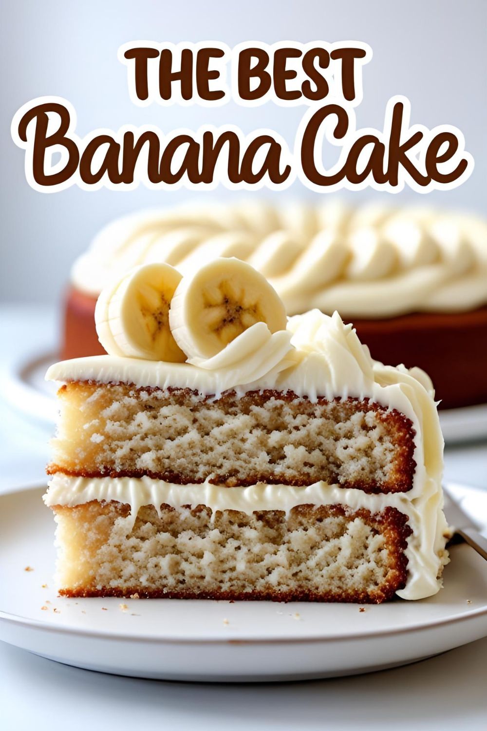 A delicious slice of moist banana cake with a generous layer of tangy cream cheese frosting on a plate.