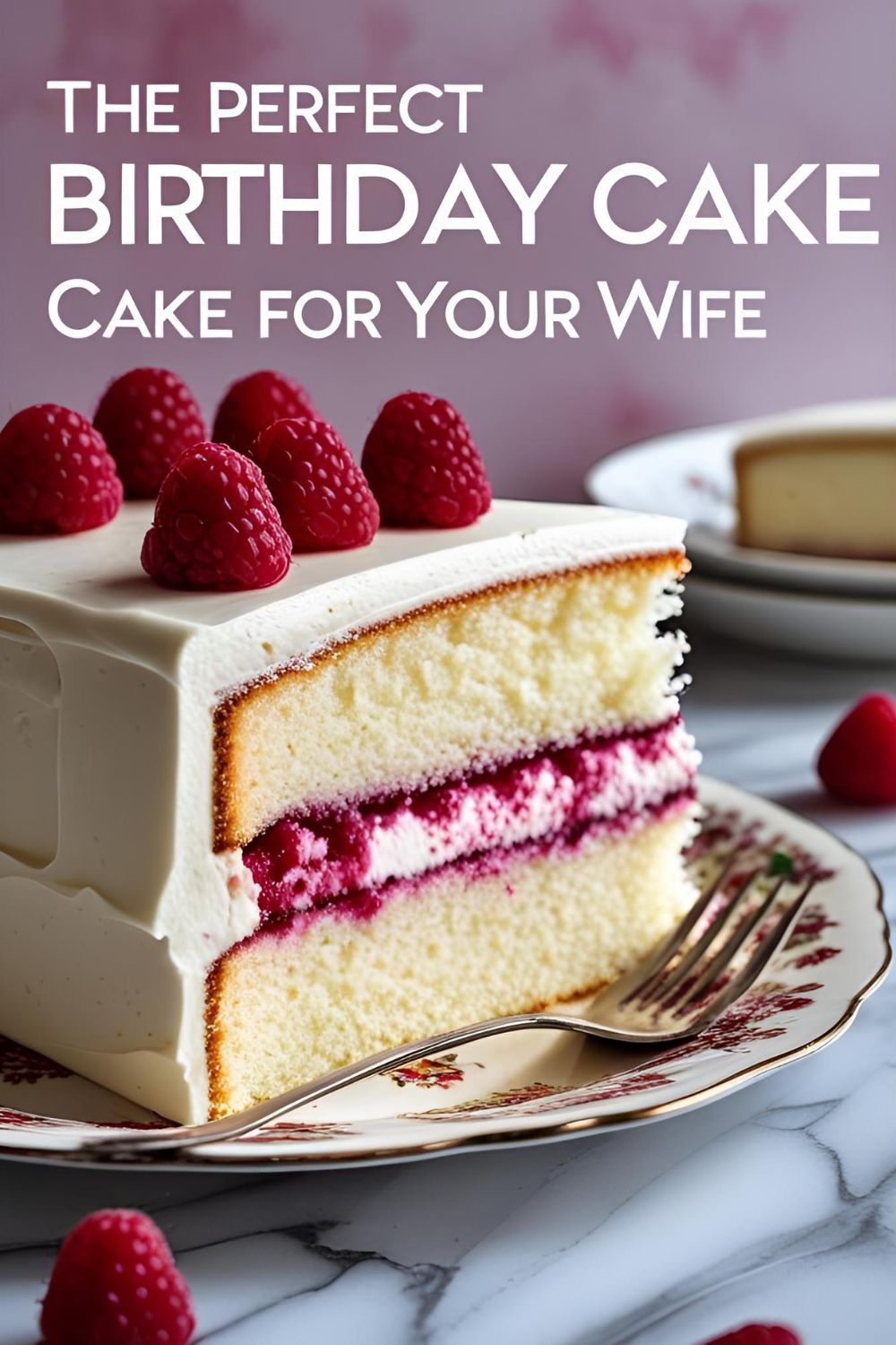 A slice of white chocolate raspberry cake on a plate with the text overlay "The Perfect Birthday Cake for Your Wife."