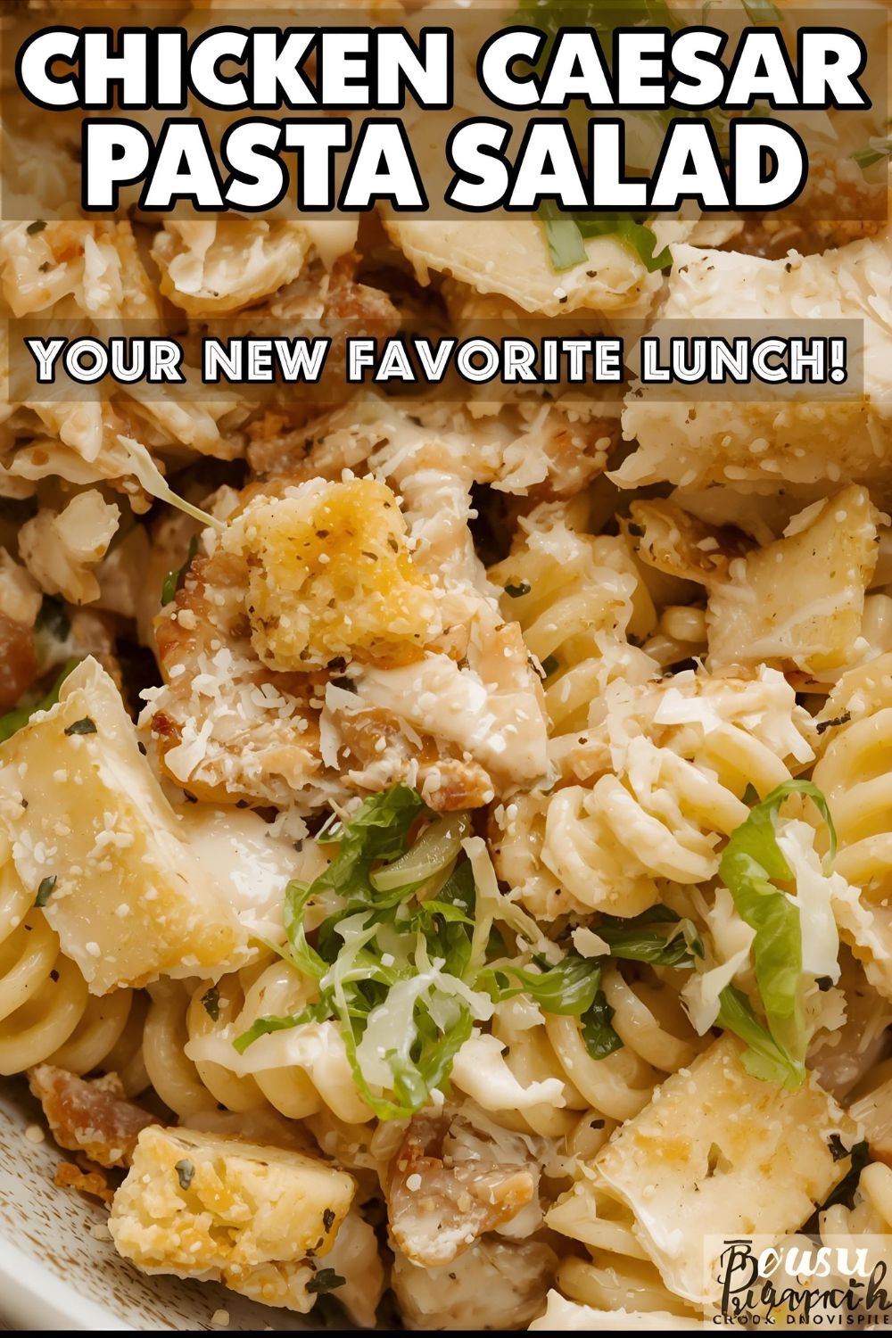 A vibrant bowl of chicken caesar pasta salad with the text "Chicken Caesar Pasta Salad."