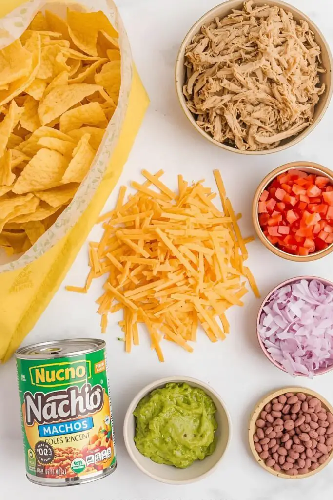All the fresh and delicious ingredients needed for the best loaded chicken nachos recipe.