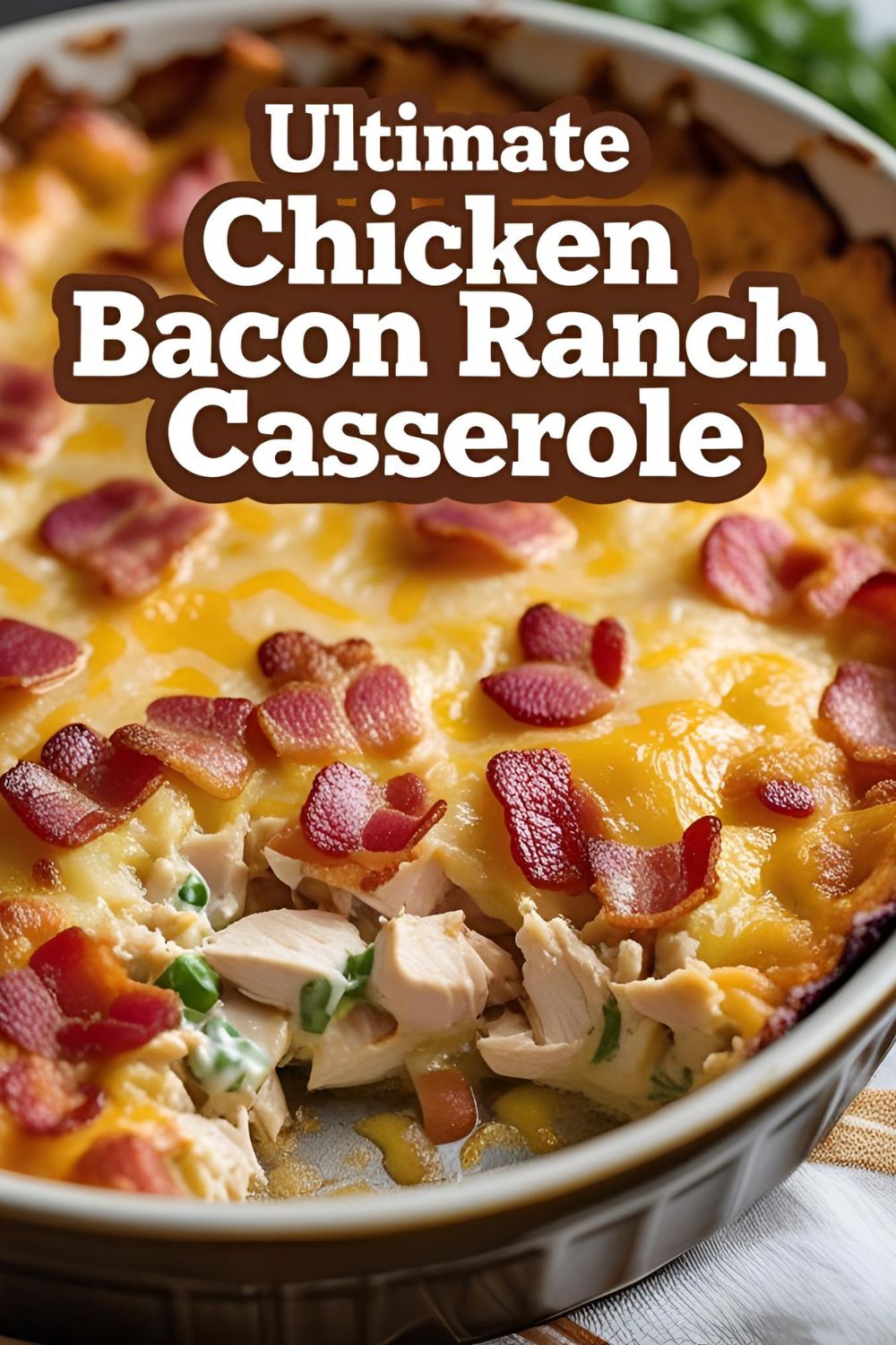 A promotional image with the text "Ultimate Chicken Bacon Ranch Casserole" over a delicious, golden-brown and bubbly casserole in a white baking dish.