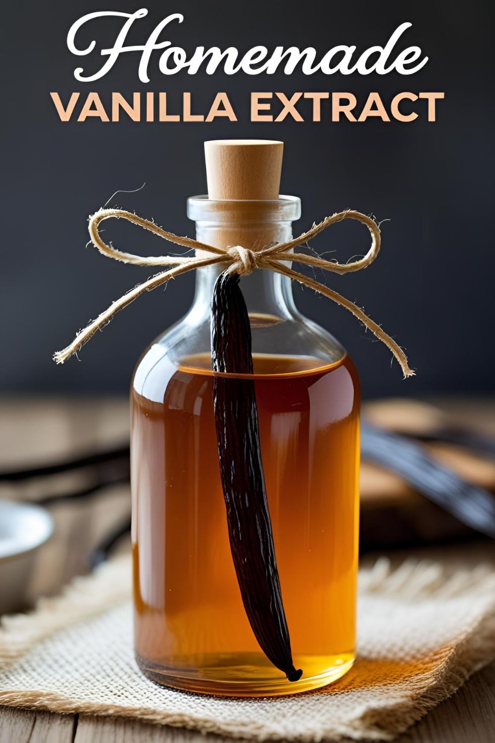 A beautiful bottle of homemade vanilla extract with the text overlay "Homemade Vanilla Extract."