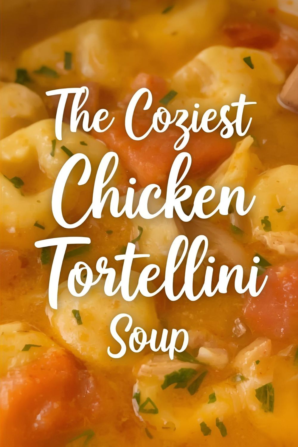 A steamy bowl of chicken tortellini soup with the text overlay "The Coziest Chicken Tortellini Soup."