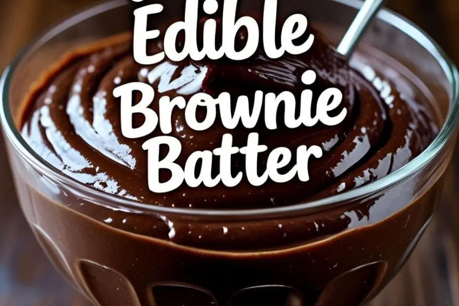 A delicious bowl of safe-to-eat edible brownie batter, studded with chocolate chips and ready to be eaten with a spoon.