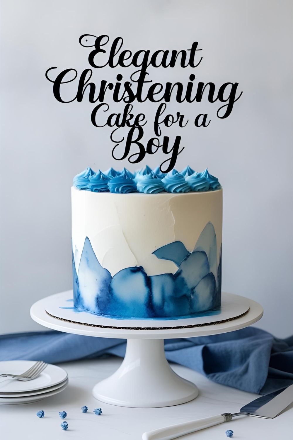An elegant blue and white watercolor christening cake on a stand with the text overlay "Elegant Christening Cake for a Boy."