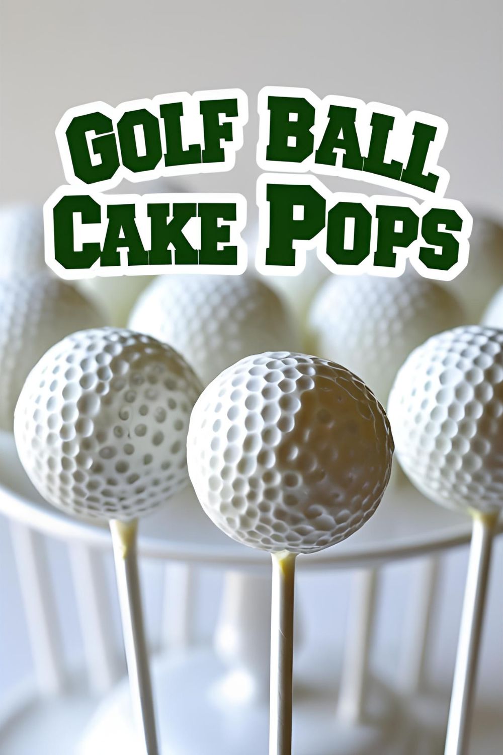 "GOLF BALL CAKE POPS" on a bright, appealing image of several white cake pops with black dimples on sticks, displayed in green "grass."