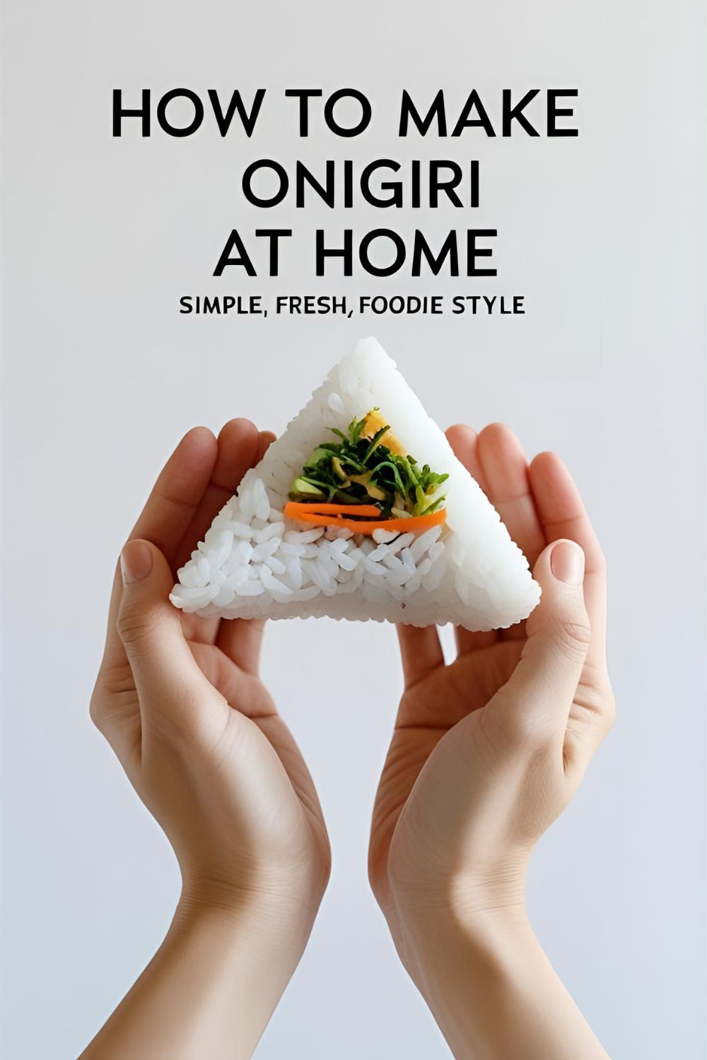 Two homemade triangular onigiri with nori strips on a plate, one with a bite taken out showing the tuna filling.