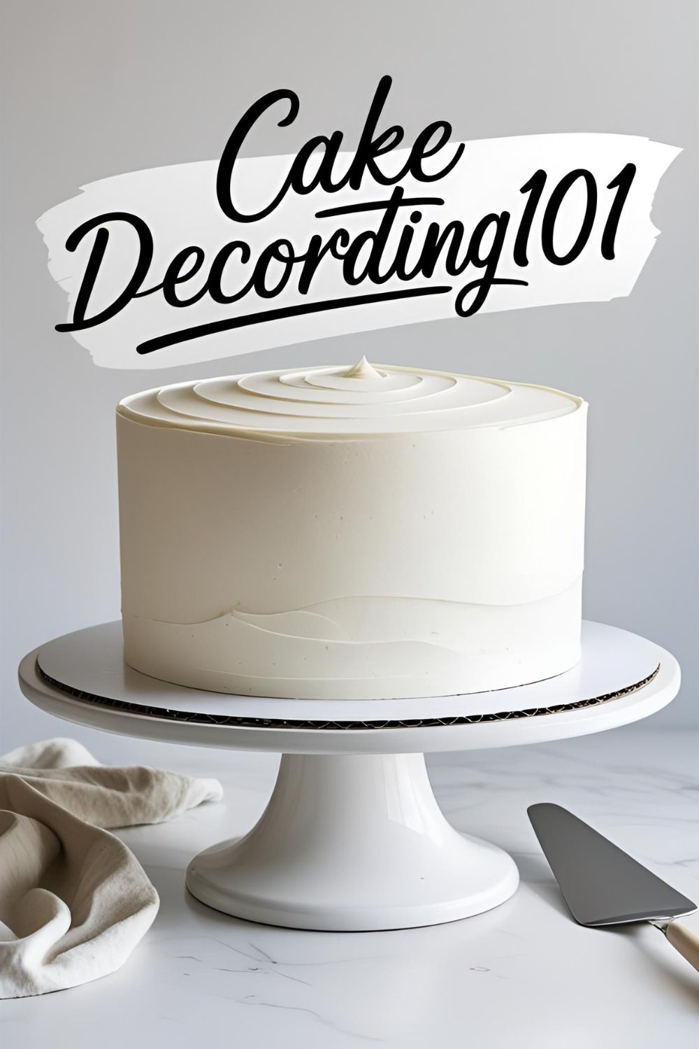 A perfectly smooth white buttercream cake on a decorating turntable, demonstrating how to frost a cake.