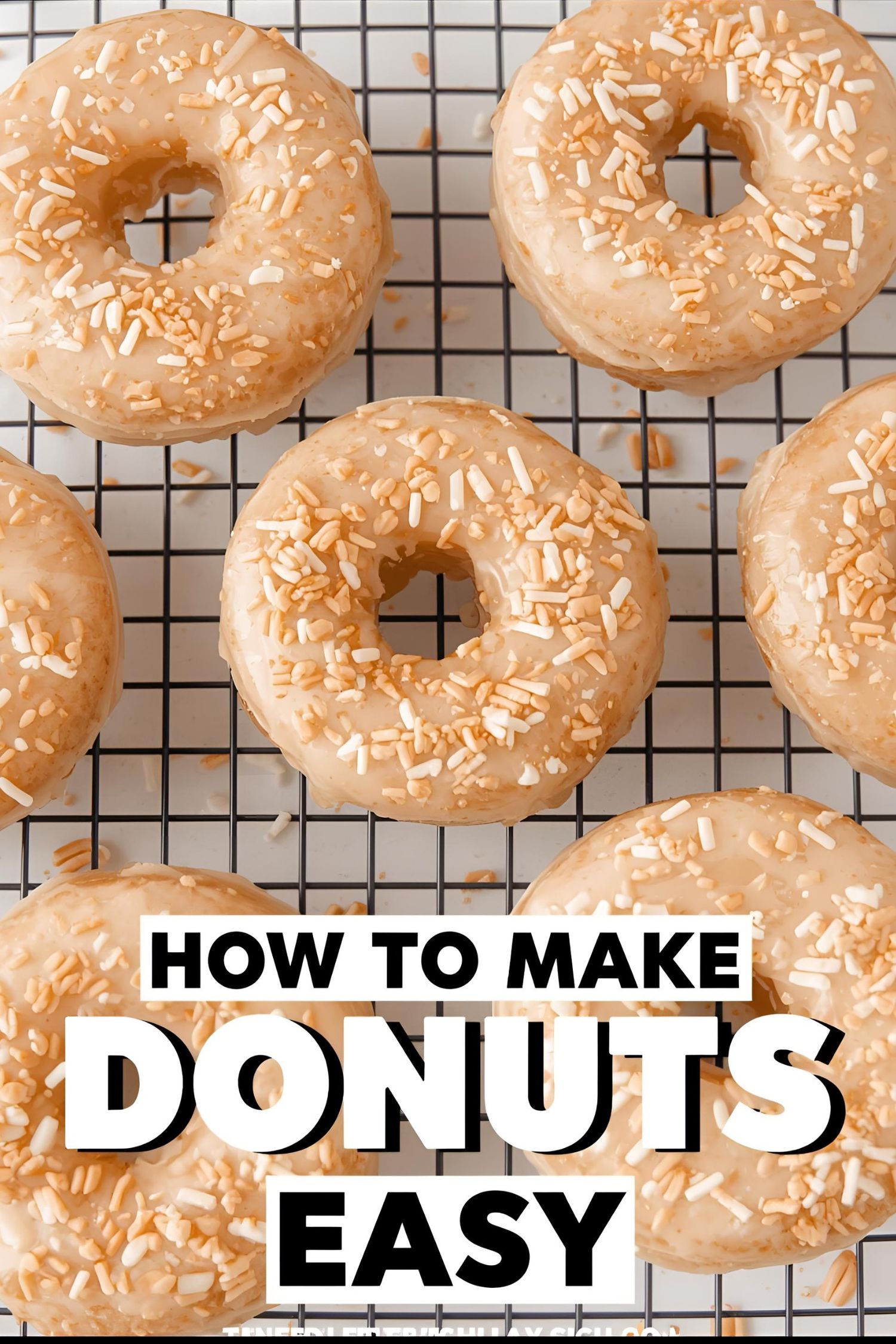Text overlay "How to Make Donuts at Home Easy" on a delicious image of several glazed donuts on a wire rack.
