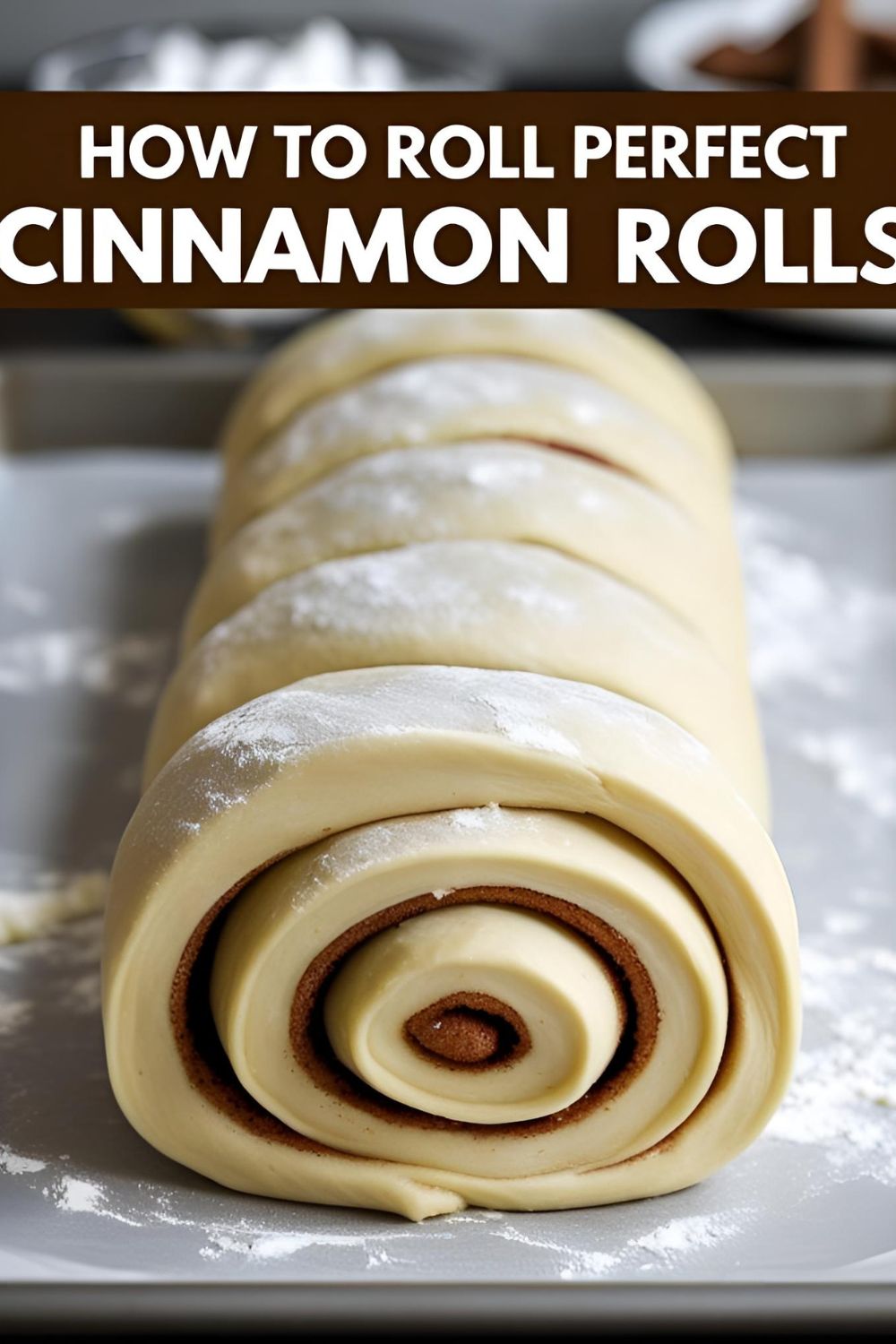 A long, tight log of cinnamon roll dough on a floured surface with the text overlay "How to Roll Perfect Cinnamon Rolls."
