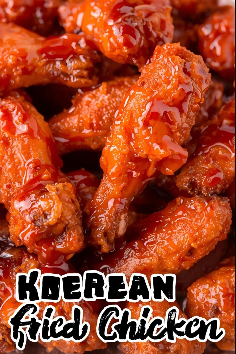 Crispy Korean fried chicken wings coated in a red sauce, with the text overlay "Korean Fried Chicken."