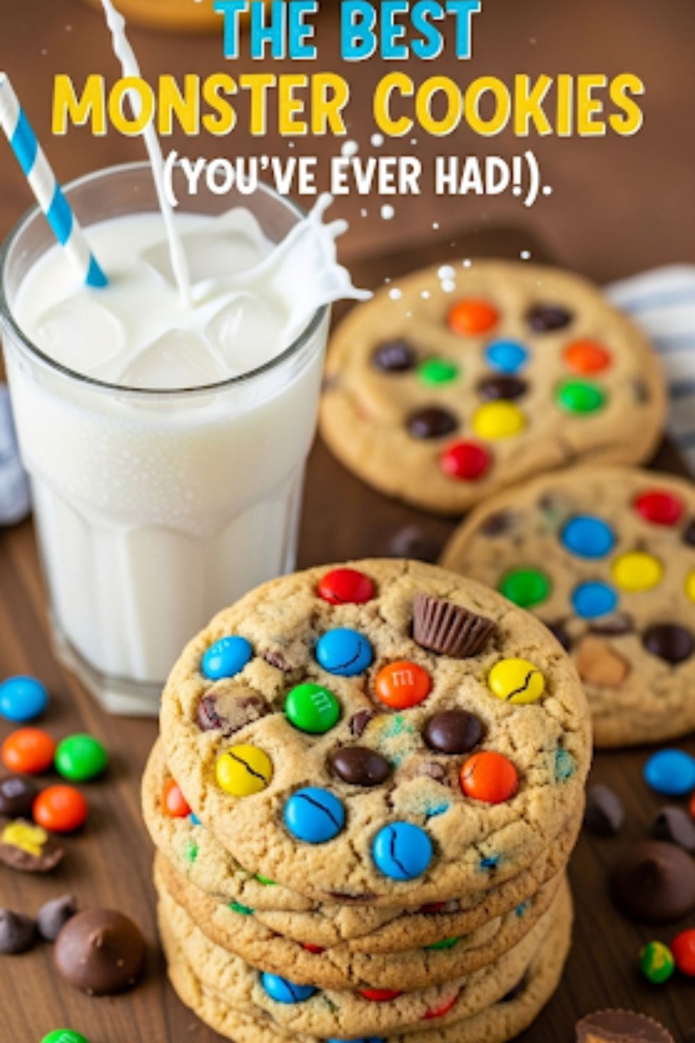 Text overlay "The Ultimate Monster Cookies Recipe" over a vibrant, fun image of a stack of giant, colorful monster cookies loaded with M&Ms and chocolate chips.