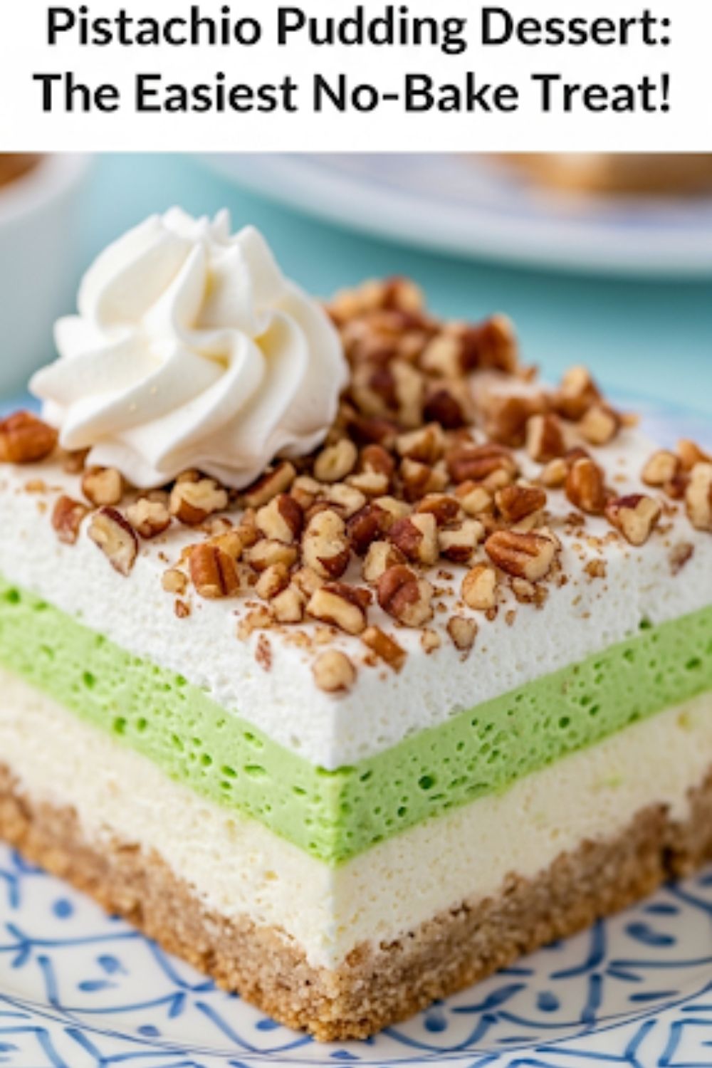 Text overlay "The Ultimate Pistachio Pudding Dessert" over a beautiful, clean shot of a single square slice of the layered green dessert on a white plate, showing all the distinct layers.