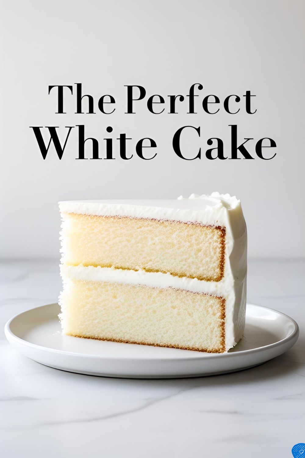 A perfect slice of plain white cake with white buttercream frosting, showing a fluffy and tender crumb.