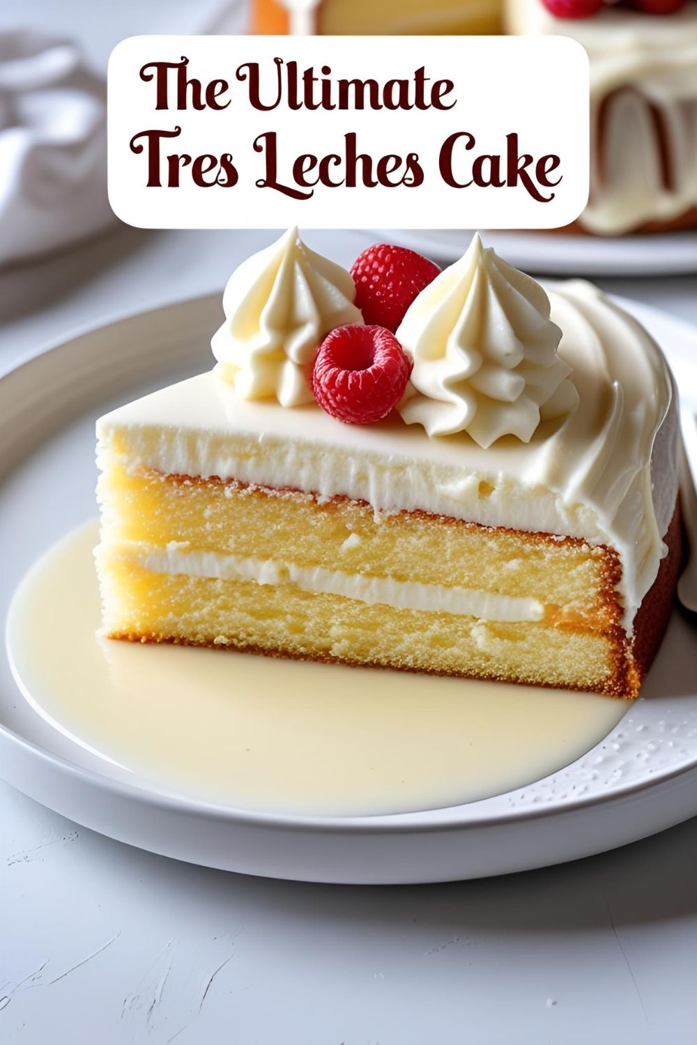 A perfect slice of homemade tres leches cake, showing its moist texture and topped with whipped cream and a strawberry.