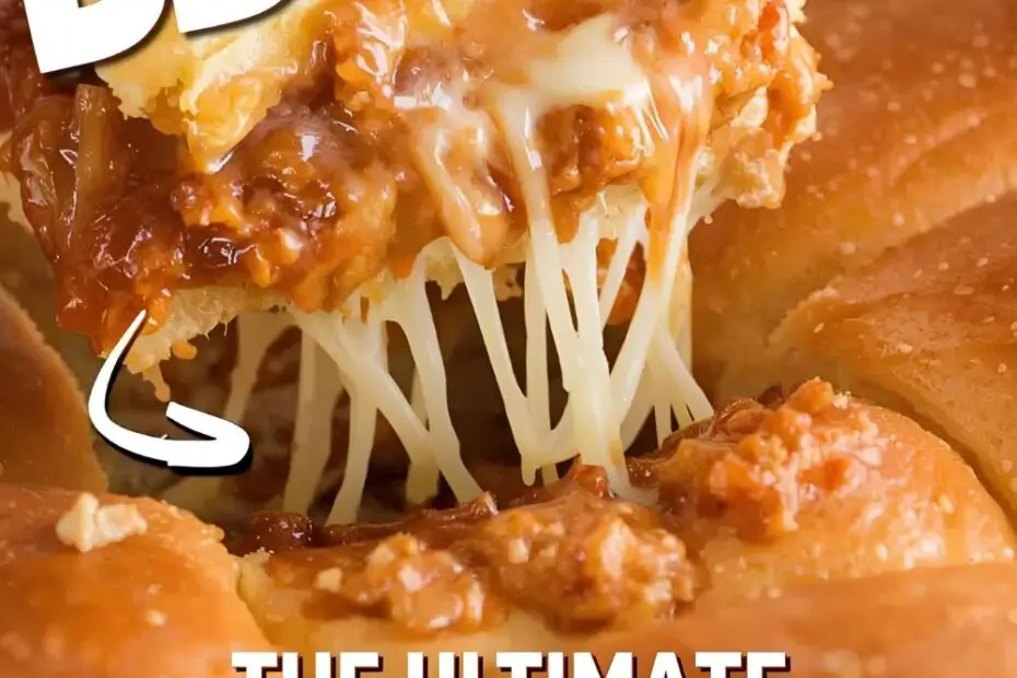 The ultimate easy recipe for BBQ chicken sliders on Hawaiian rolls, showing a delicious cheese pull.