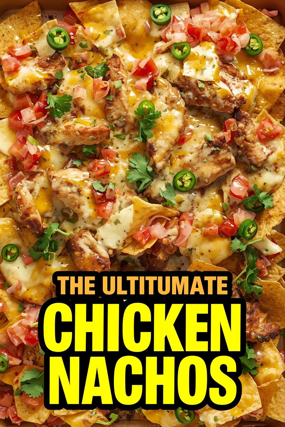 The ultimate easy recipe for loaded sheet pan chicken nachos that are perfect for a party.