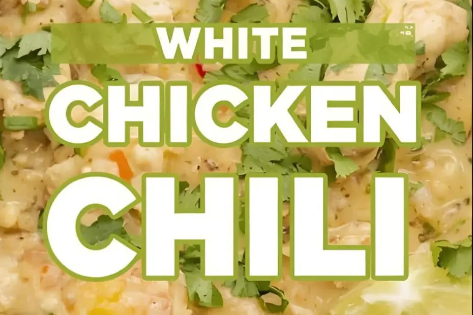 A bowl of creamy white chicken chili with visible chicken, beans, and green chiles, with the text overlay "White Chicken Chili."