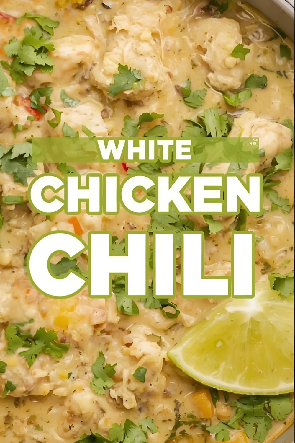 A bowl of creamy white chicken chili with visible chicken, beans, and green chiles, with the text overlay "White Chicken Chili."