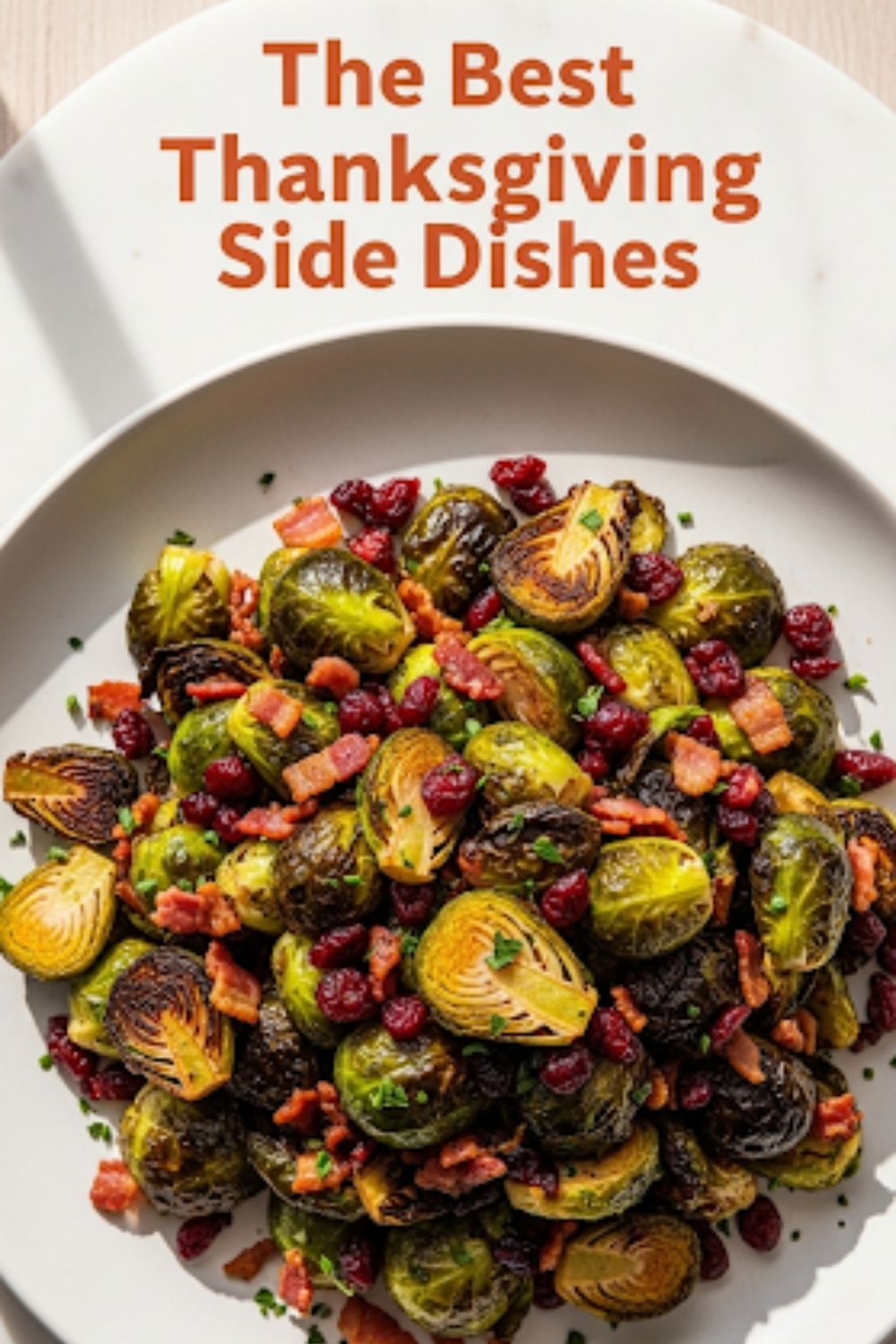 Text overlay that reads "The Best Thanksgiving Side Dishes" over a vibrant platter of roasted Brussels sprouts with bacon and cranberries.